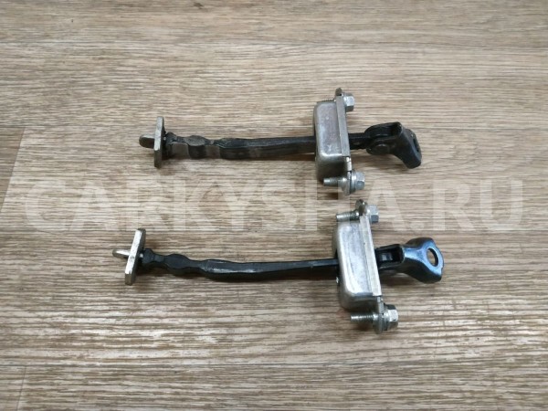 Ограничитель двери задний Nissan Note 