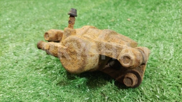 Суппорт тормозной задний правый Mitsubishi Mitsubishi i оригинальный номер MR955066