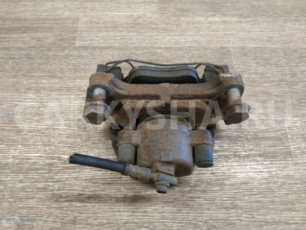 Суппорт тормозной передний правый Volkswagen Tiguan оригинальный номер 5N0615124