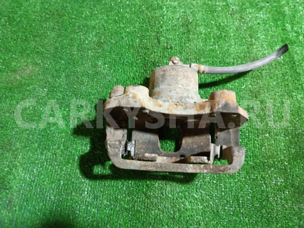 Суппорт тормозной передний правый Nissan Avenir 