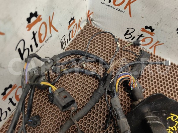 Коса под капотом BMW X1 