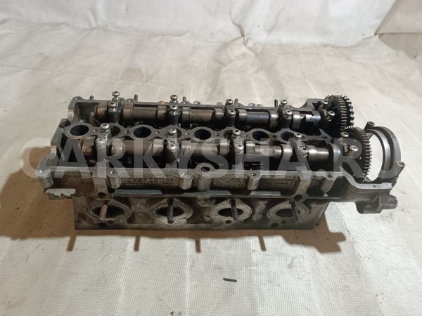 Головка блока цилиндров BMW X1 оригинальный номер 7787521