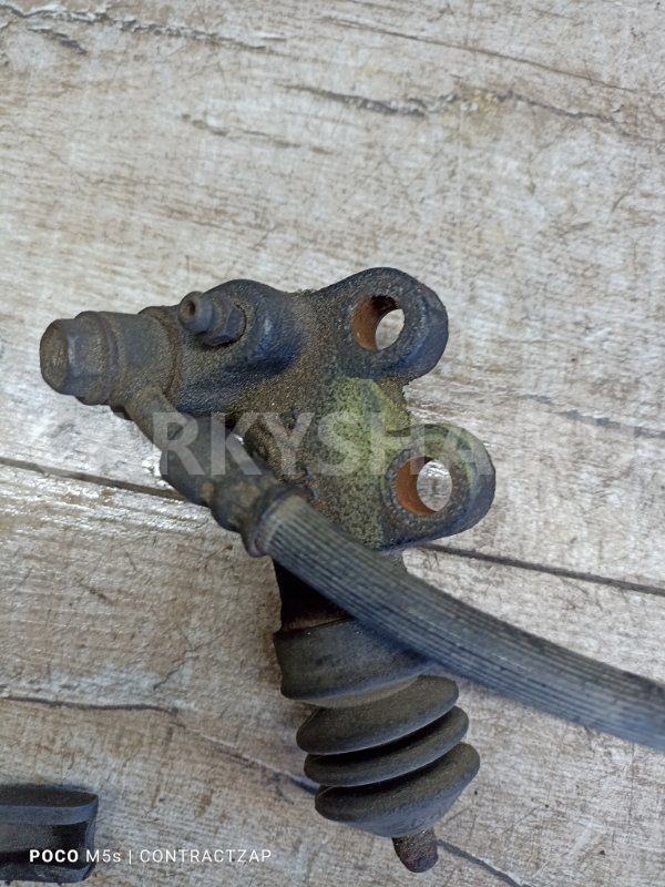 Рабочий цилиндр сцепления Nissan X-Trail II (2007—2011) Nissan X-Trail оригинальный номер 30620-AU40A