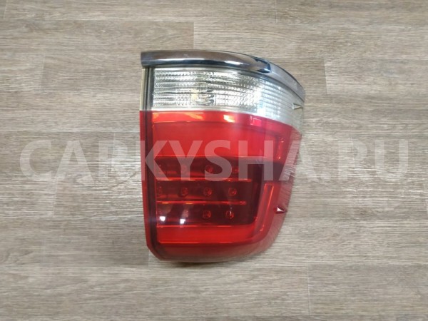 Фонарь задний наружный левый Toyota Land Cruiser 